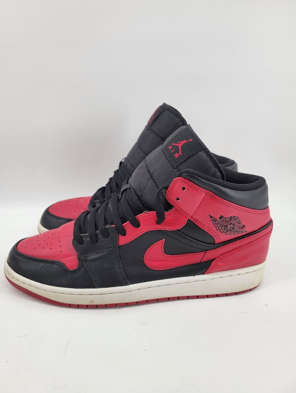 Nike Air Jordan 1 Mid sneakers in a black and gym red colorway Size 12